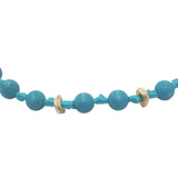 Chaine de cheville dorée en perles turquoise, disques dorés et noeuds turquoise