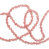 Collier doré perles rouges et blanches avec noeuds rouges 75 cm