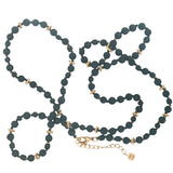 Collier doré perles noires, couronnes dorées et noeuds noirs 64 cm