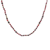 Collier doré perles rouges, en bois, couronnes dorées et noeuds rouges 64 cm