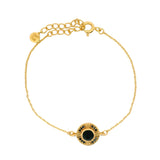 Bracelet doré médaille ronde striée avec onyx noire et zircons noirs