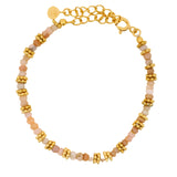 Bracelet doré en quartz rose et disques dorés