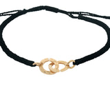 Bracelet cordon noir menottes dorées