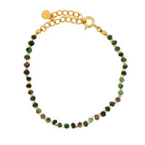 Gold bracelet and faceted natural stones