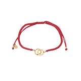 Bracelet cordon rouge menottes dorées