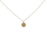 Gold necklace with zircons and scarab medal