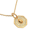Gold necklace with zircons and scarab medal