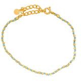Bracelet doré fil noeud et perles doré
