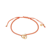 Bracelet cordon orange menottes dorées