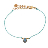 Bracelet cordon et pampille pierre