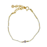 Bracelet doré avec tourmaline au centre et tubes dorés