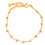 Bracelet doré avec tourmaline rose, couronnes  et tubes dorés