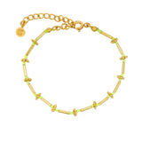 Bracelet doré tubes avec perles jaune fluo et couronnes dorées