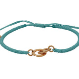 Bracelet cordon turquoise menottes dorées