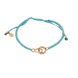 Bracelet cordon turquoise menottes dorées
