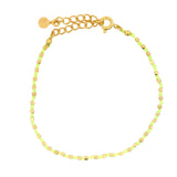 Bracelet doré noeud cordon jaune fluo et billes facettées