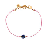 Pink cord chain bracelet and talismans
