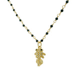 Collier doré onyx noire poisson zircons blancs et noirs
