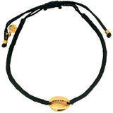 Bracelet doré en cordon bleu marine avec cauri doré