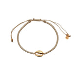 Bracelet cordon cauri doré