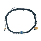 Navy blue cord bracelet with yellow and blue African pearl
