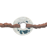 Colored cord bracelet and hammered hole piece