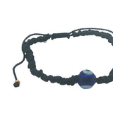 Bracelet doré cordon tressé bleu marine oeil bleu