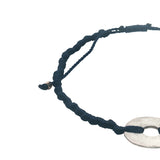 Colored cord bracelet and hammered hole piece