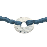 Colored cord bracelet and hammered hole piece