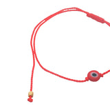 Fine wire bracelet with red and black flat eye