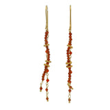 Golden hanging earrings with stones
