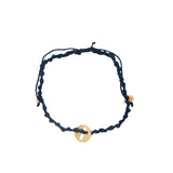 Bracelet sur cordon bleu marine medaille dorée croix ajourée