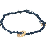 Bracelet sur cordon bleu marine medaille dorée croix ajourée