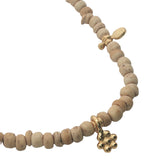 Collier doré perles en bois beige, pampilles rondes et en forme de fleur 75 cm
