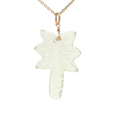 Gold necklace and natural stone palm tree