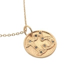 Gold necklace with number 13 medal and white zircons