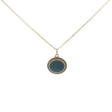 Gold necklace with flat stone and zircons