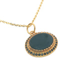 Gold necklace with flat stone and zircons
