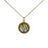 Gold necklace with stone and zircon medal "every day more" on the back