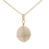 Gold necklace with Saint Lucia's eye shell and gold thread