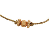 Gold cord bracelet with tassel