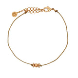 Gold cord bracelet with tassel
