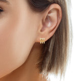 Puce d'oreilles dorée trilogie et pampilles en zircons blancs