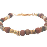 Bracelet doré mix perles de bois et fantaisie avec disques dorés