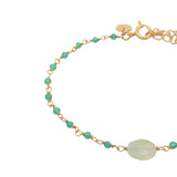 Golden bracelet with faceted stones and small stones