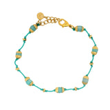 Bracelet doré fil bleu avec coupoles dorées et Agathe Bleue
