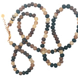 Collier doré perles en corne marron et beige 64 cm