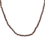 Collier doré perles bois marron clair et disques dorés 60 cm