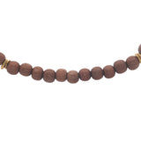 Collier doré perles bois marron clair et disques dorés 60 cm