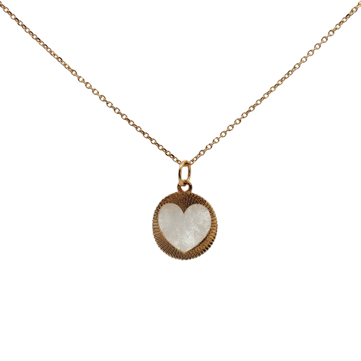 Collier doré médaille coeur texturé et pierre